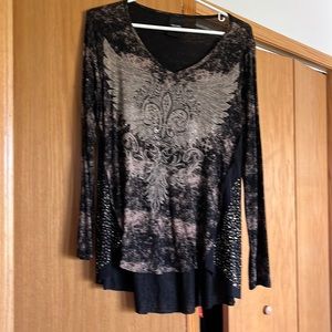 Size small, black with tan and sparkly dots